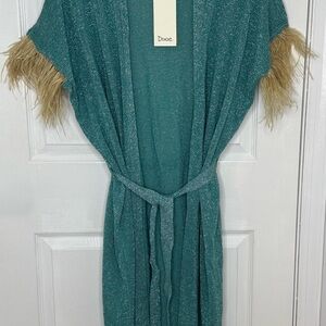 Dixie Elegant Turquoise Sparkling kimono with Tan Fur Trim on sleeve.